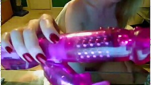 Mature masturbates on cam with Dildo